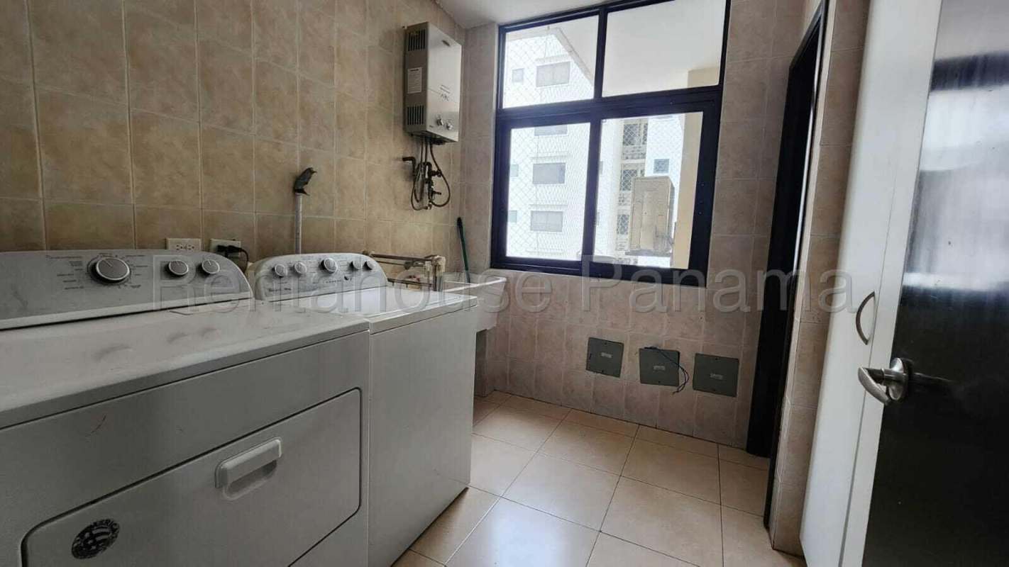 Bedroom with large windows, ocean view, ensuite bathroom in PH Costa del Este Panama