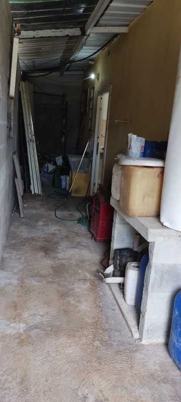 Single-story beige house with front porch, fenced yard, secured windows in Chilibre Panama