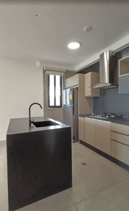 Modern kitchen open plan dining with city panorama in PH Victory Wellness Coco del Mar Panama