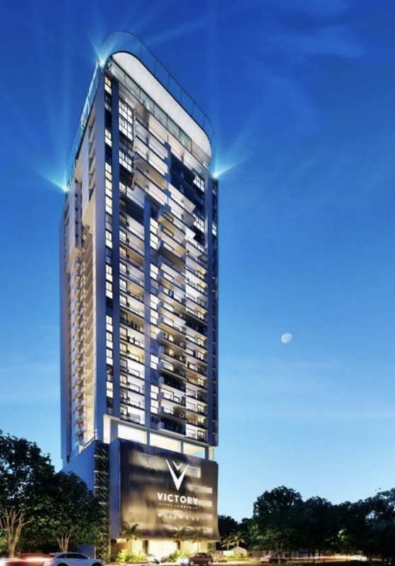 Modern minimalist bedroom with air conditioner and panoramic window ocean city skyline PH Victory Wellness Panama