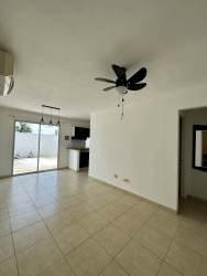 Bright living room with AC, ceiling fan and tile floor in Puerto Caimito home by Costa Verde Panama