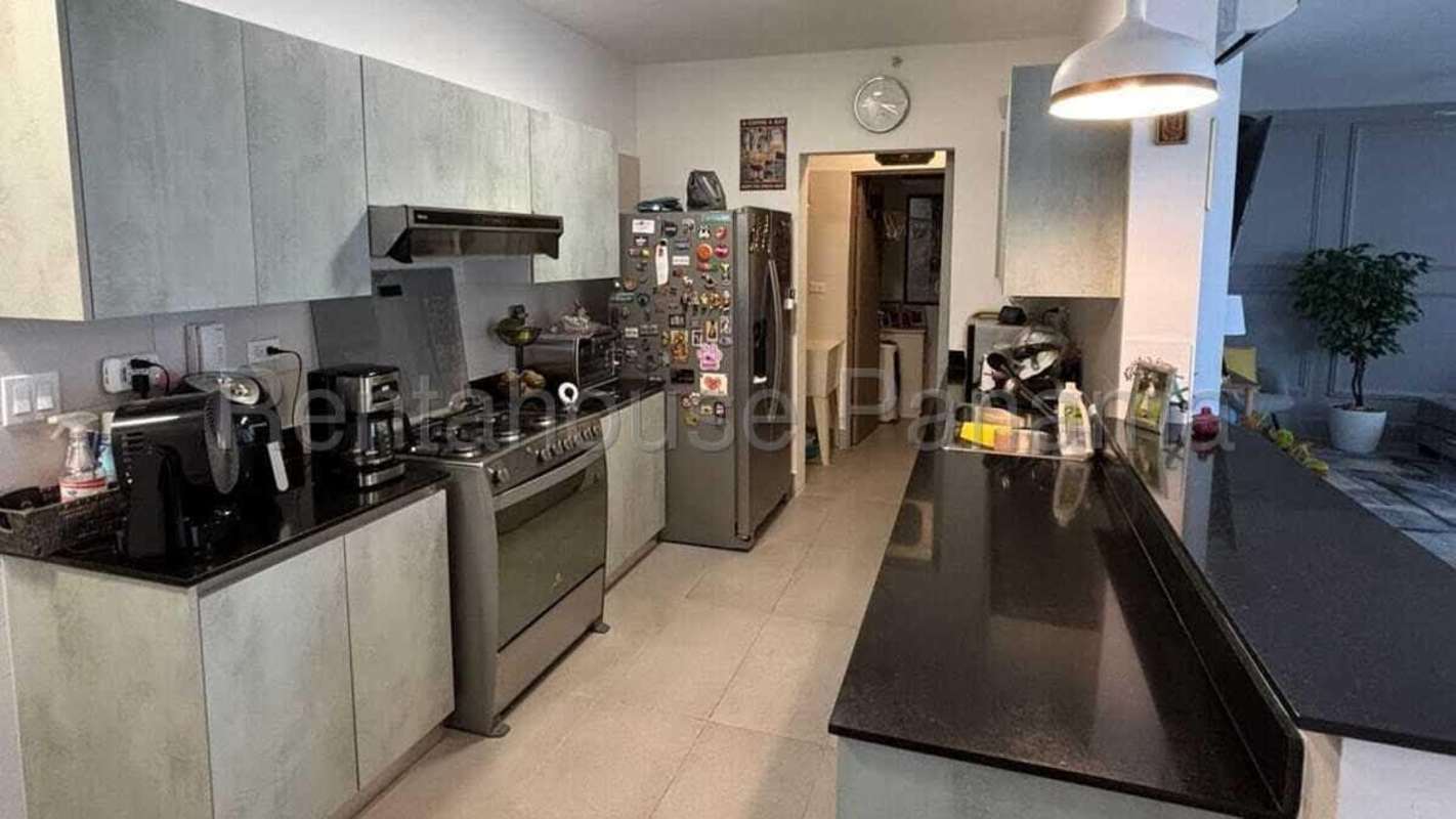 Kitchen with granite countertops, stainless appliances in PH Altamira Hato Pintado