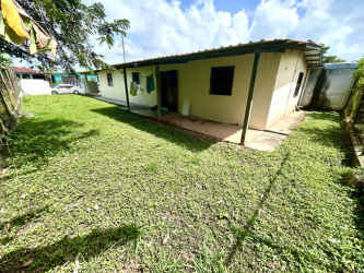 Large fenced backyard covered patio grassy yard Residencial Nuevo Arraiján Panama