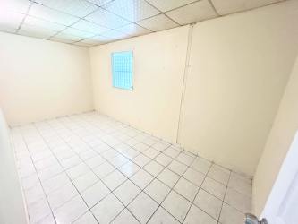 Covered patio with metal roof fenced grassy backyard Nuevo Arraiján Arraiján Panama