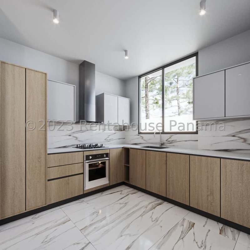 Modern kitchen with marble floor, built-in oven, gas cooktop, window with natural light Albrook Panama