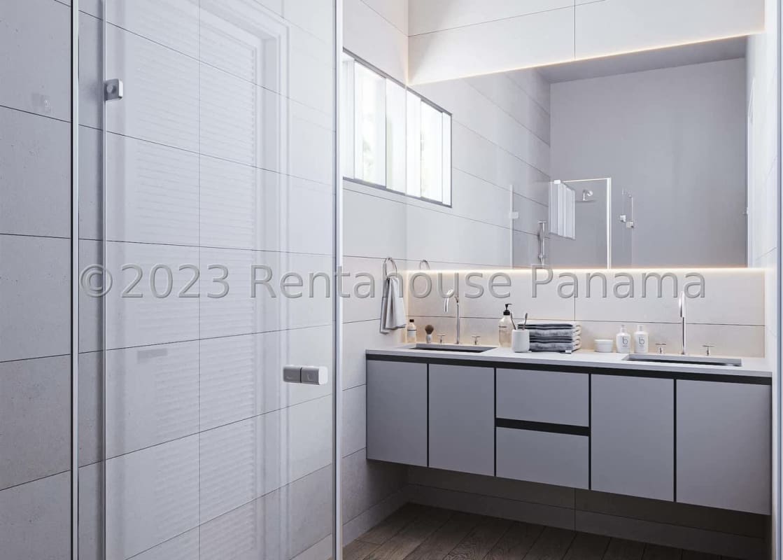 Spacious bedroom with large windows, neutral palette, marble floor in Albrook Residences Panama