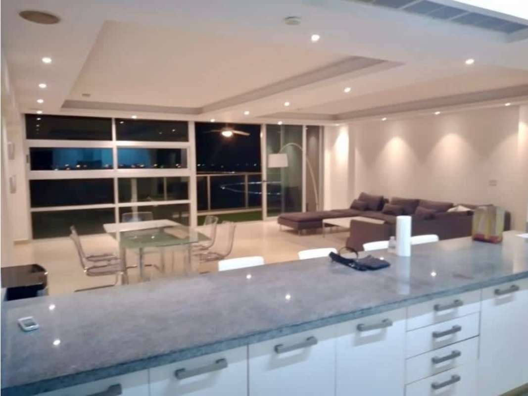 Modern kitchen with island and dining area open plan PH Waters on the Bay Panama City
