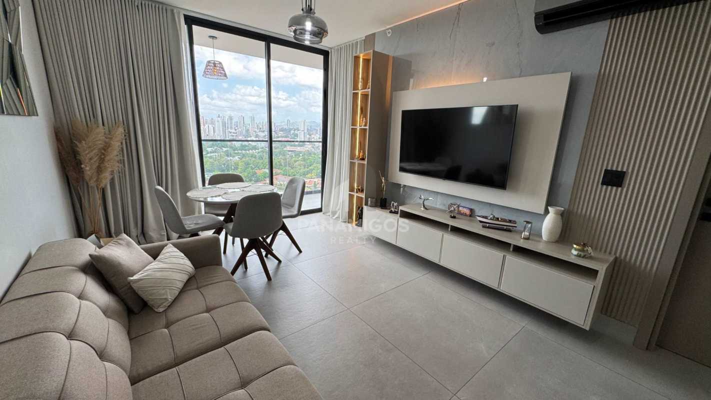 Open-plan modern kitchen with granite countertops and appliances at Victory Wellness Tower Coco del Mar Panama