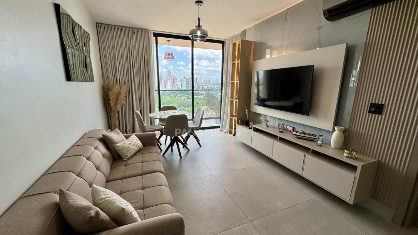 Bedroom with textured accent wall, modern finish, built-in closet, split AC in Coco del Mar Panama apartment