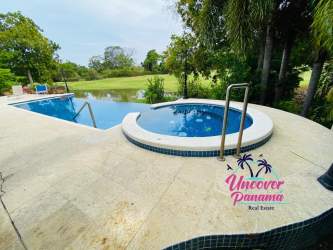 Contemporary kitchen with granite counters, appliances and tropical window views Costa Blanca Villa Panama