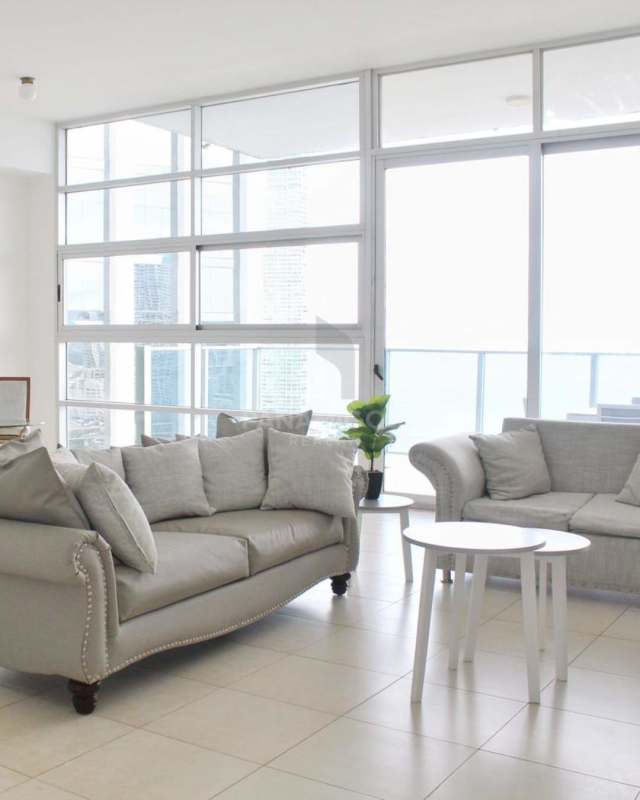 Modern dining space with large windows, city view in Waters On The Bay Panama Avenida Balboa