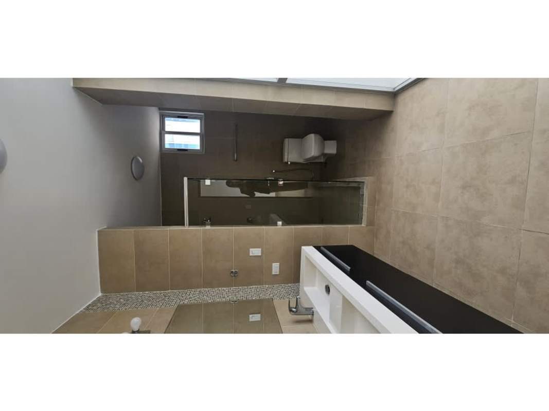 Bedroom with wardrobe, ensuite bathroom, AC, window view in Obarrio Panama