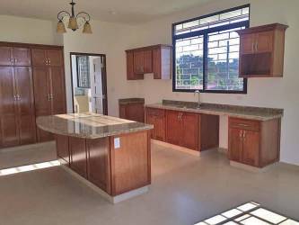 Balcony area overlooking backyard with mountain views in David Panama home for sale