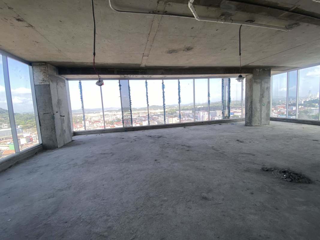 Open loft style unfinished commercial space in PH BICSA Tower with ocean views ready for build out
