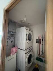 Dining area with sliding glass doors opening to balcony with nature view in PH Parterre Panama Pacifico