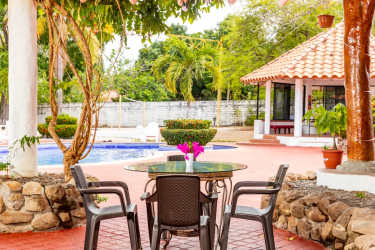 Mediterranean-inspired tropical garden pool area gazebos lush lawns Playa Malibu Villa Gorgona Panama