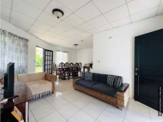 Spacious backyard with covered terrace and garden in residential community La Fontana David Panama