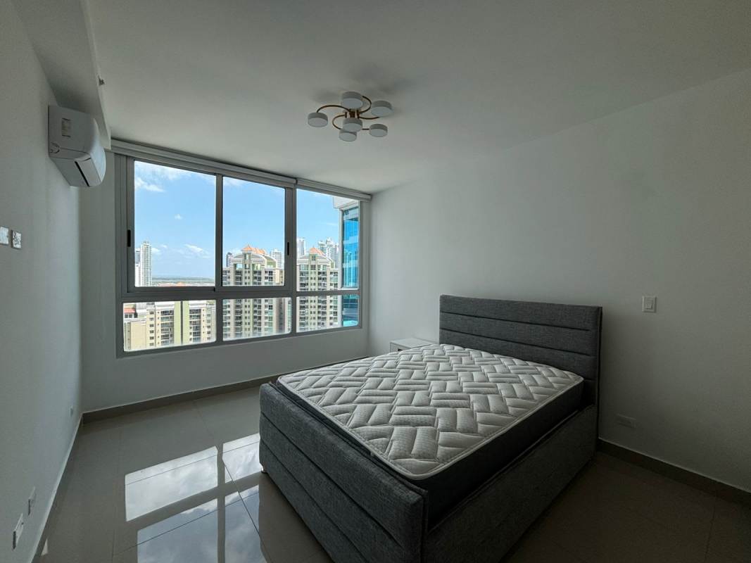 Second bedroom with city view, large windows, at Top Towers Costa del Este Panama City