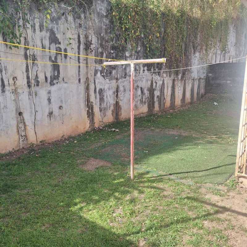 Outdoor walled backyard area with clothesline and greenery in Villa Zaita Panama house rental
