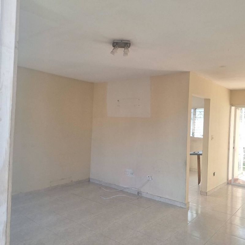 Bright interior living area with tiled floors in residential house rental Los Laureles Villa Zaita Panama