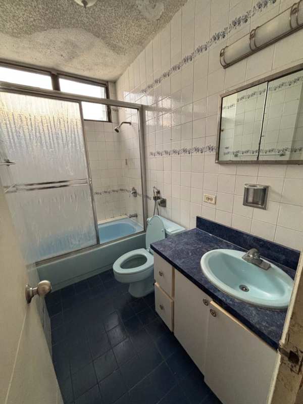 Spacious bedroom with closet, fan, AC and window PH Coral Plaza El Cangrejo Panama