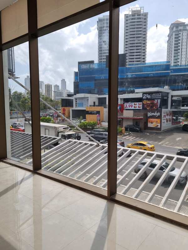 Large glass storefront in commercial plaza Via Brasil Obarrio Panama