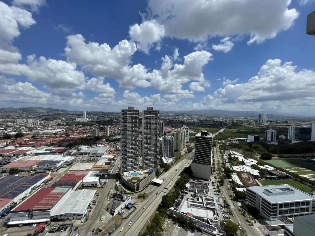 Modern bedroom featuring balcony and skyline sea views in PH Country Club Panama