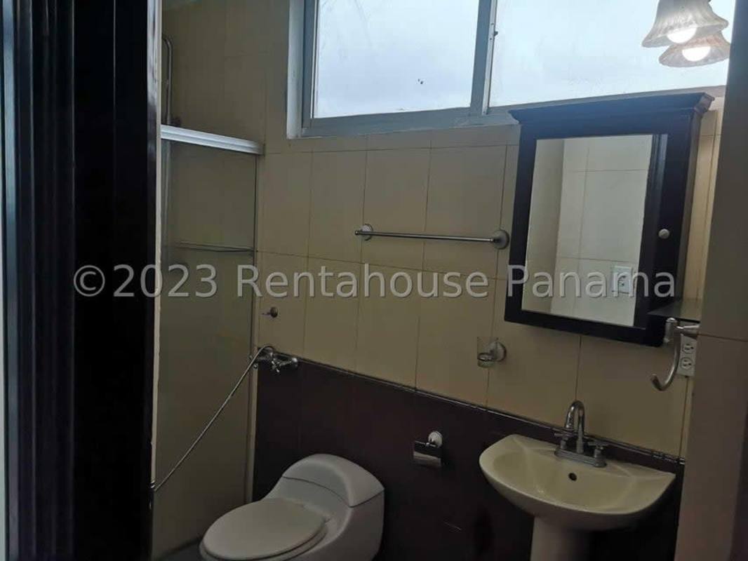 Contemporary bathroom with window pedestal sink in Villa de Las Fuentes