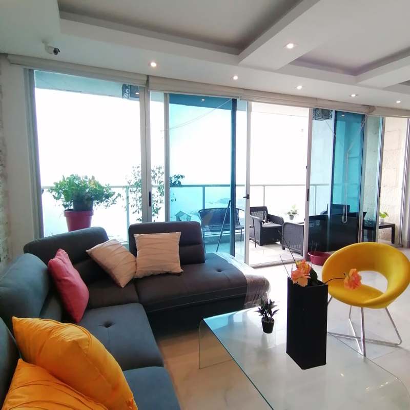 Modern kitchen with granite counters and appliances in PH Q Tower Panama City