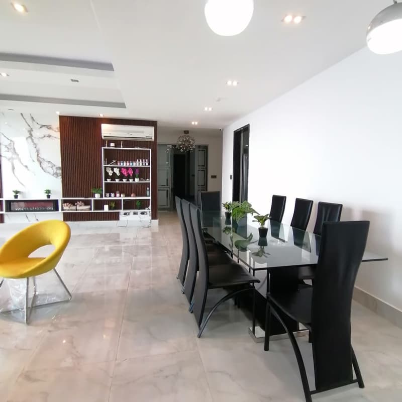 Modern open dining and living area with ocean views PH Q Tower Punta Pacifica