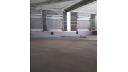 Warehouse interior loading docks with roller doors and concrete floors in Zona Libre France Field Colon Panama