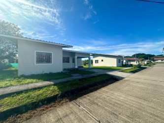 Unfurnished bedroom with window security bars and tiled floor in Boquerón rental home