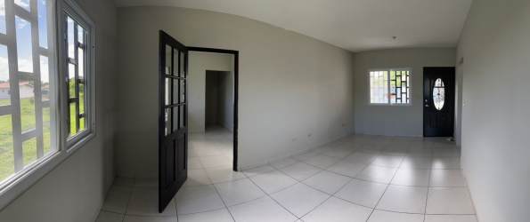 Bathroom with walk-in shower, pedestal sink and window Boquerón Chiriquí rental home