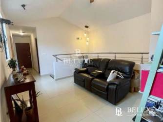 Second floor family lounge with modern furniture in PH River Valley Panama Pacifico rental house