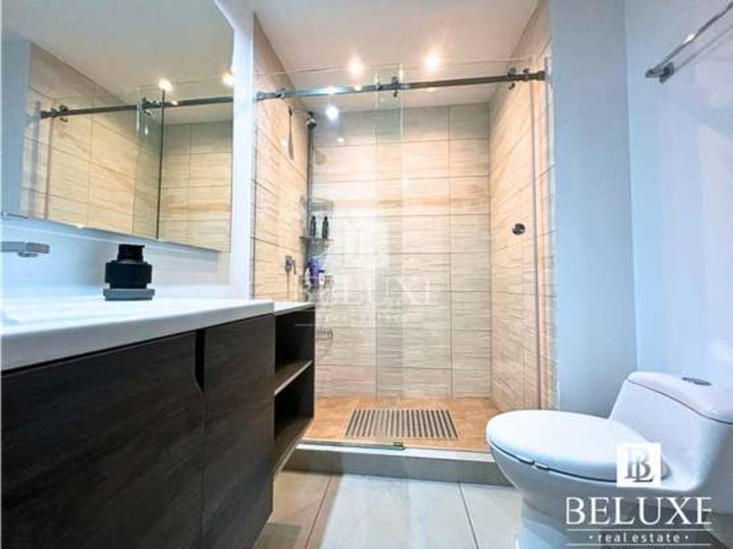 Master bedroom with large windows and panoramic views in PH Van Gogh Panama