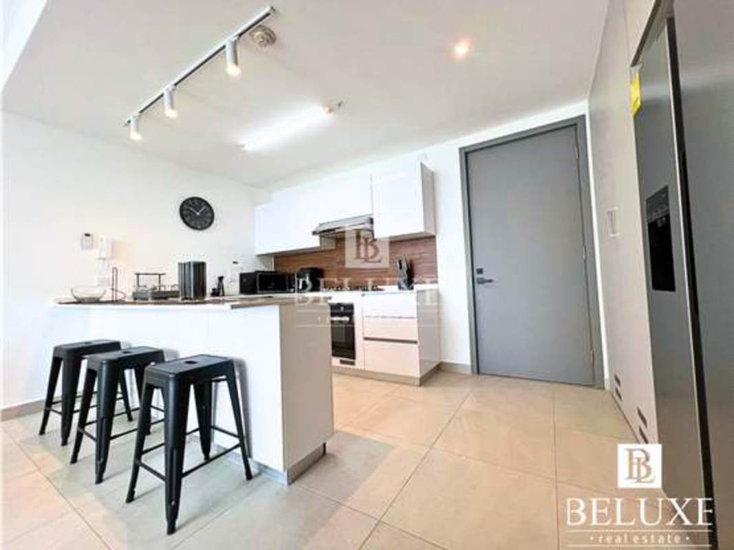 Modern open kitchen with breakfast bar in PH Van Gogh El Cangrejo Panama