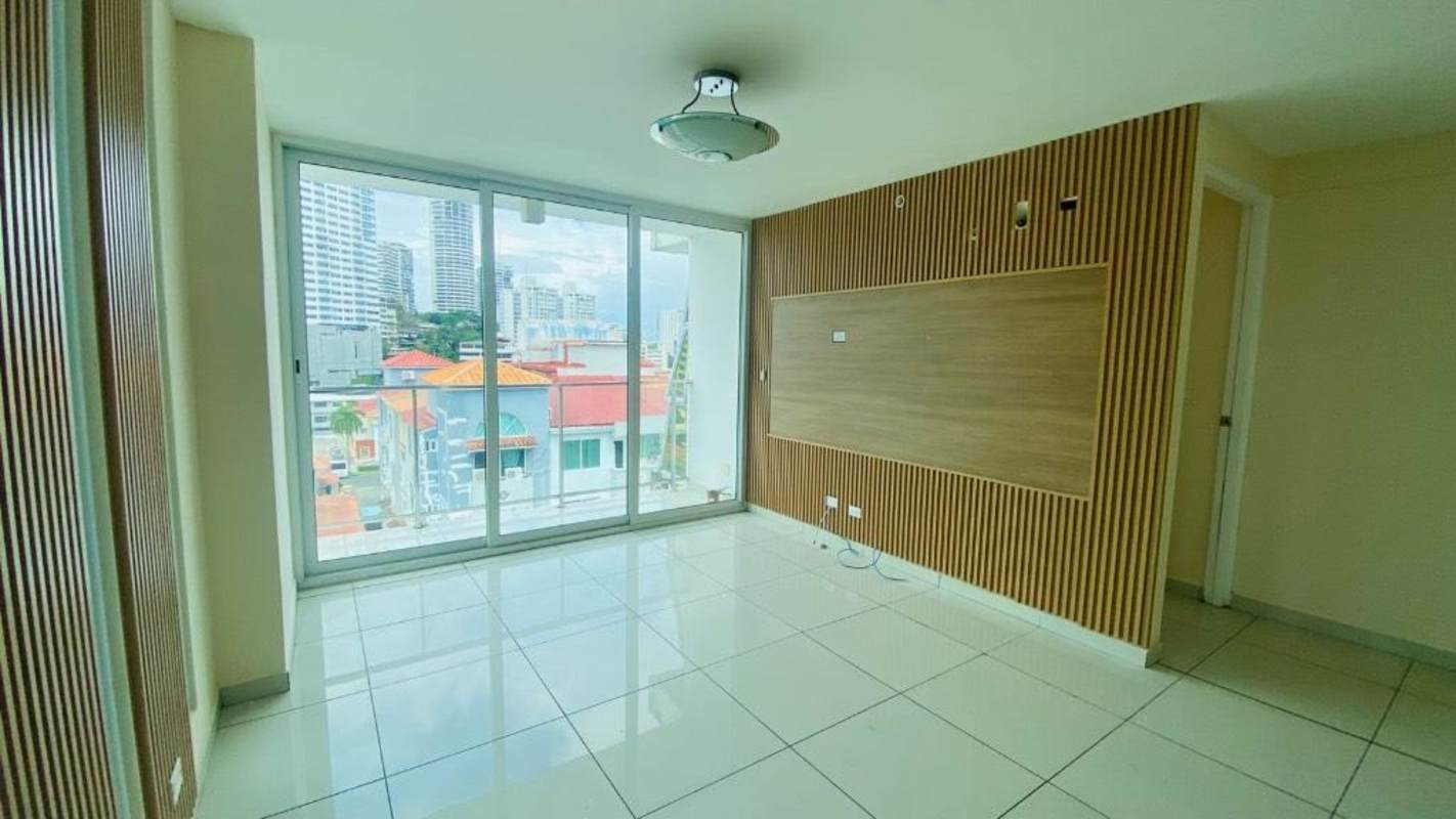 Unfurnished living-dining room with balcony Bella Vista apartment Panama City