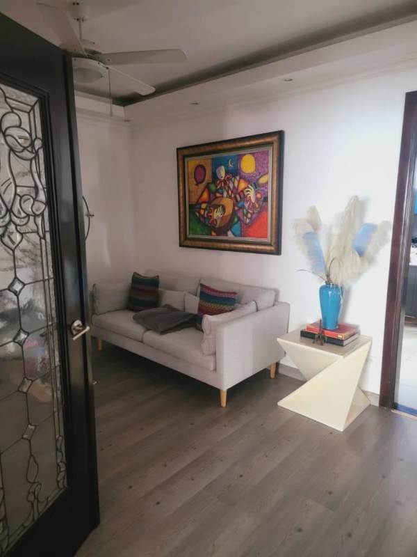 Rooftop infinity pool area with lounge and city views in PH Tao Panama City