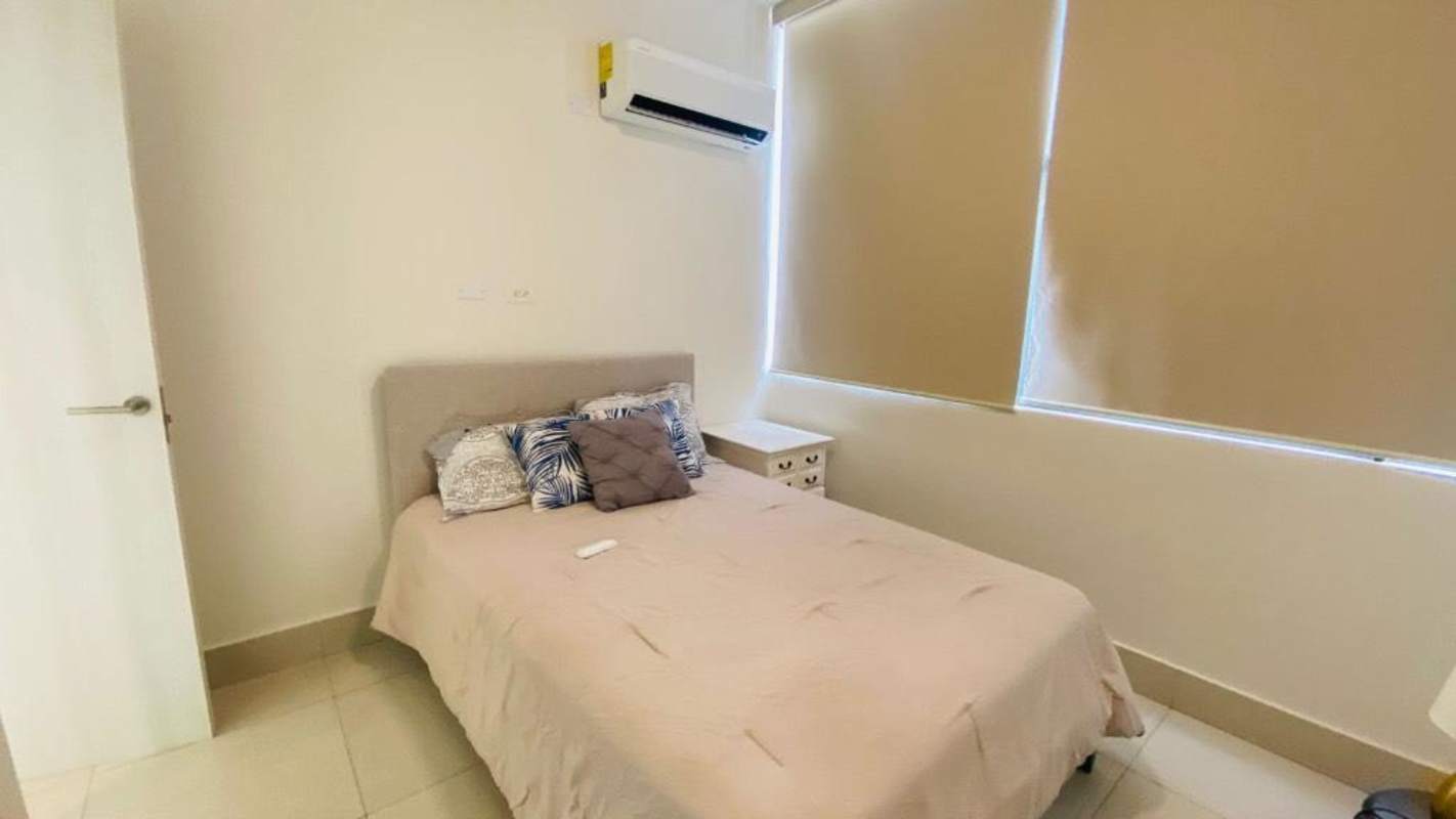 Rooftop lounge terrace overlooking Panama skyline and Pacific Ocean in luxury tower Coco del Mar Panama