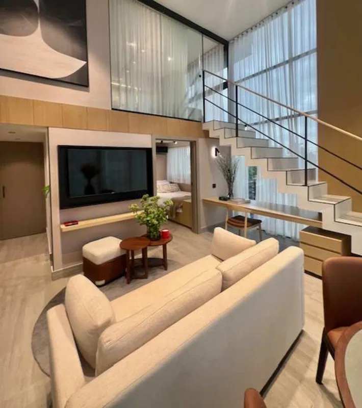 Kitchen with modern cabinetry and appliances in duplex apartment PH Wave Tower Panama City