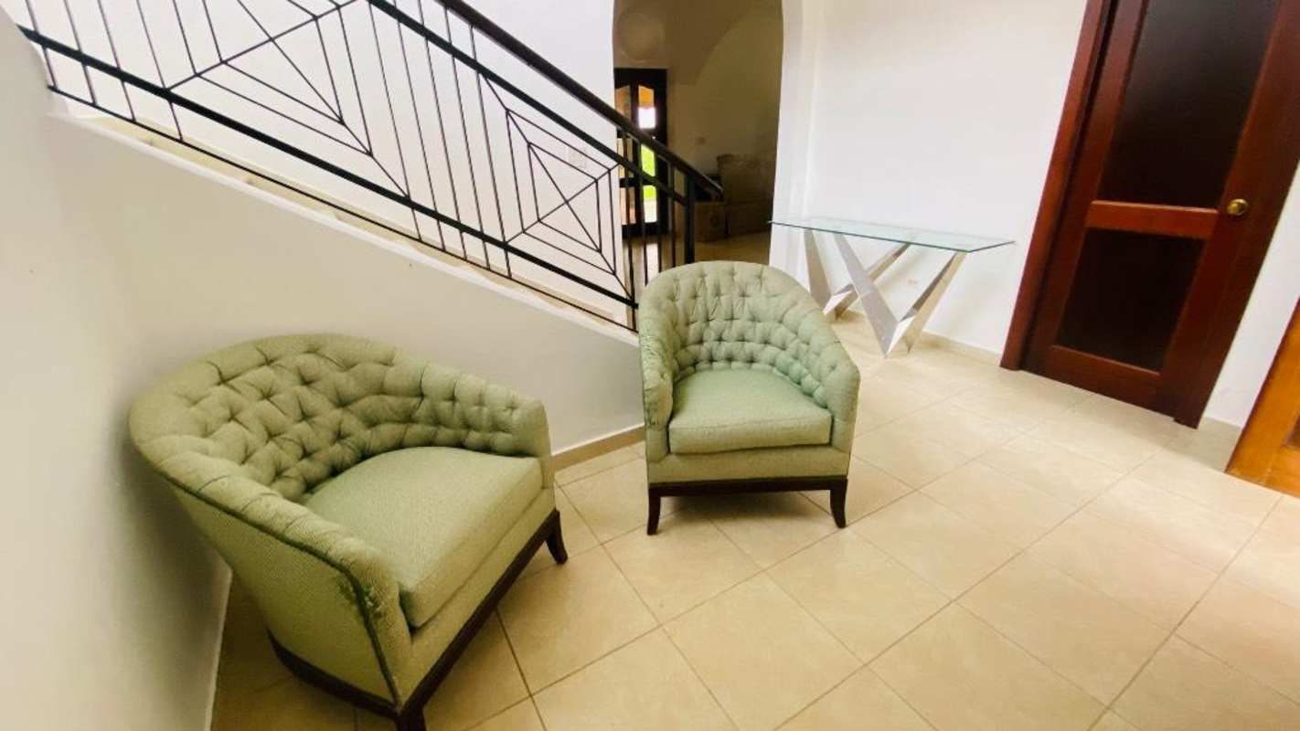 Laundry room with washer, dryer, large windows at Villa de las Fuentes Panama City