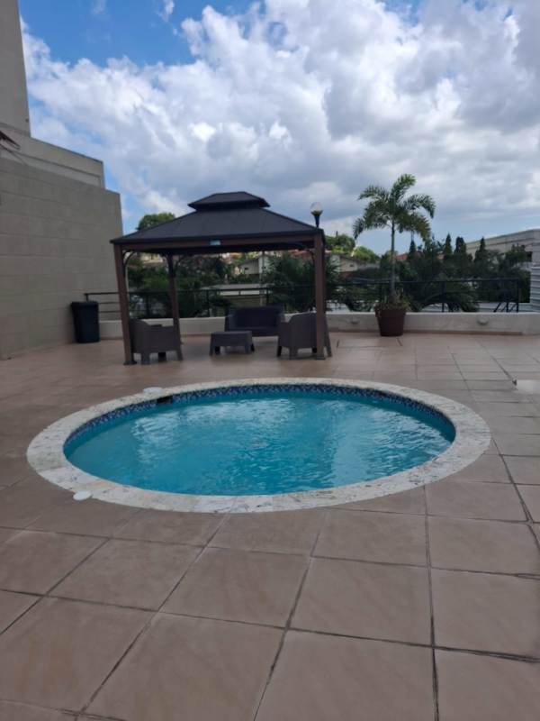 Spacious bedroom, built-in closet, large window in apartment PH Portoalegre Panama