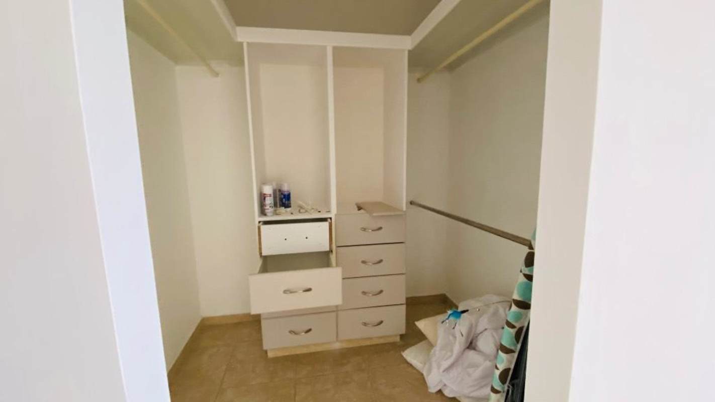 Spacious walk-in closet with shelving in luxury Costa del Este rental home
