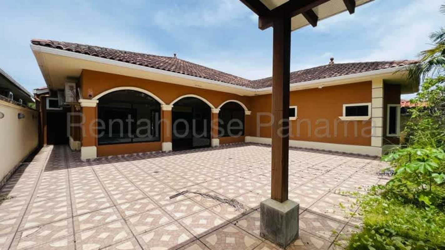 Empty bedroom with built-in wardrobe and large window in Costa Sur house for sale Panama.