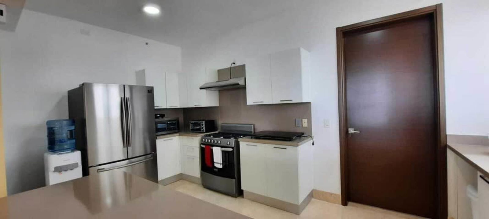 State-of-the-art fitness center with panoramic windows overlooking pool in Santa Maria PH Greenview