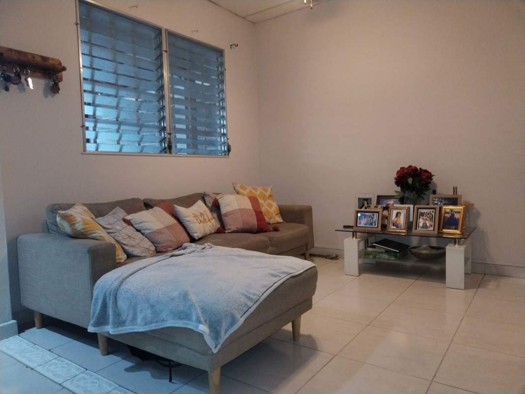 Contemporary dining area with wood furniture and mirrors Don Bosco Panama