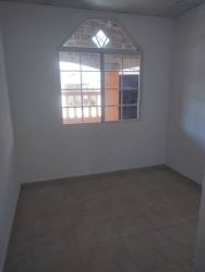 Small bedroom with arch window, tiled floor and white walls in house for rent Mystic City La Chorrera