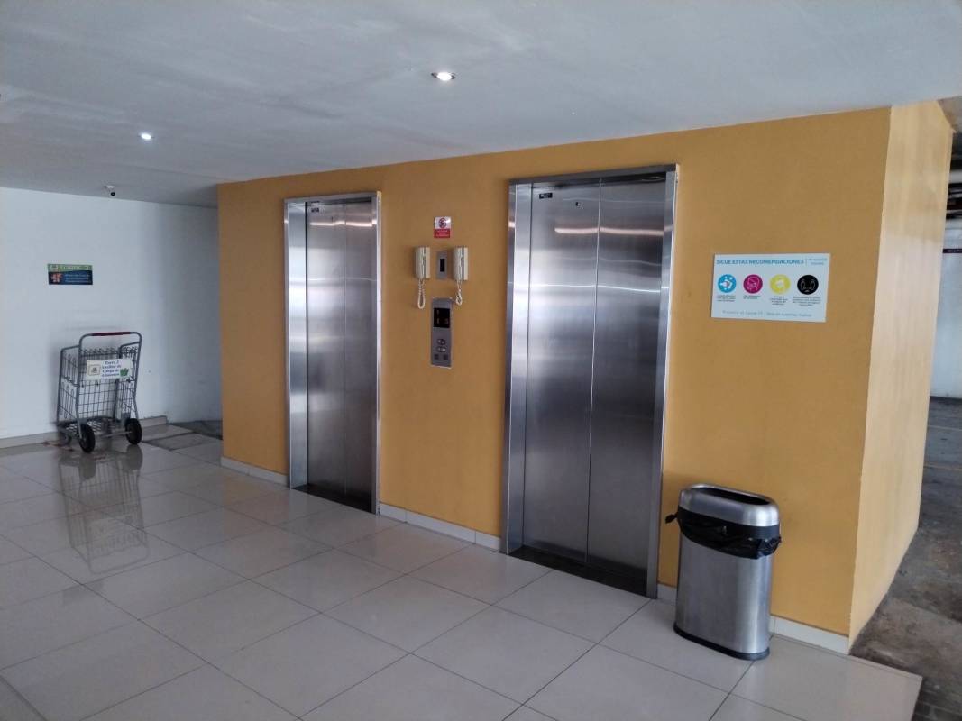 Apartment bedroom with wooden wardrobe and ceramic floors in PH Alsacia Tower Vía Ricardo J. Alfaro Panama
