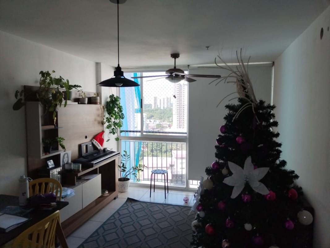 Open plan living and dining with large windows, ceramic floors in Alsacia Tower Panama