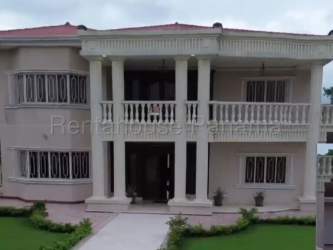 Spacious living room with sofas, tray ceiling, recessed lighting Margarita Colón Panama luxury home